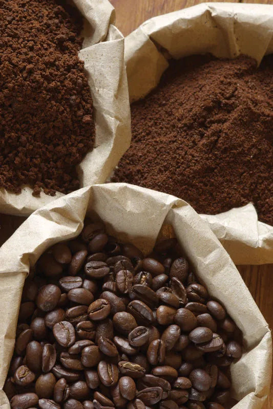 Assorted Bags of Coffee Beans and Powder